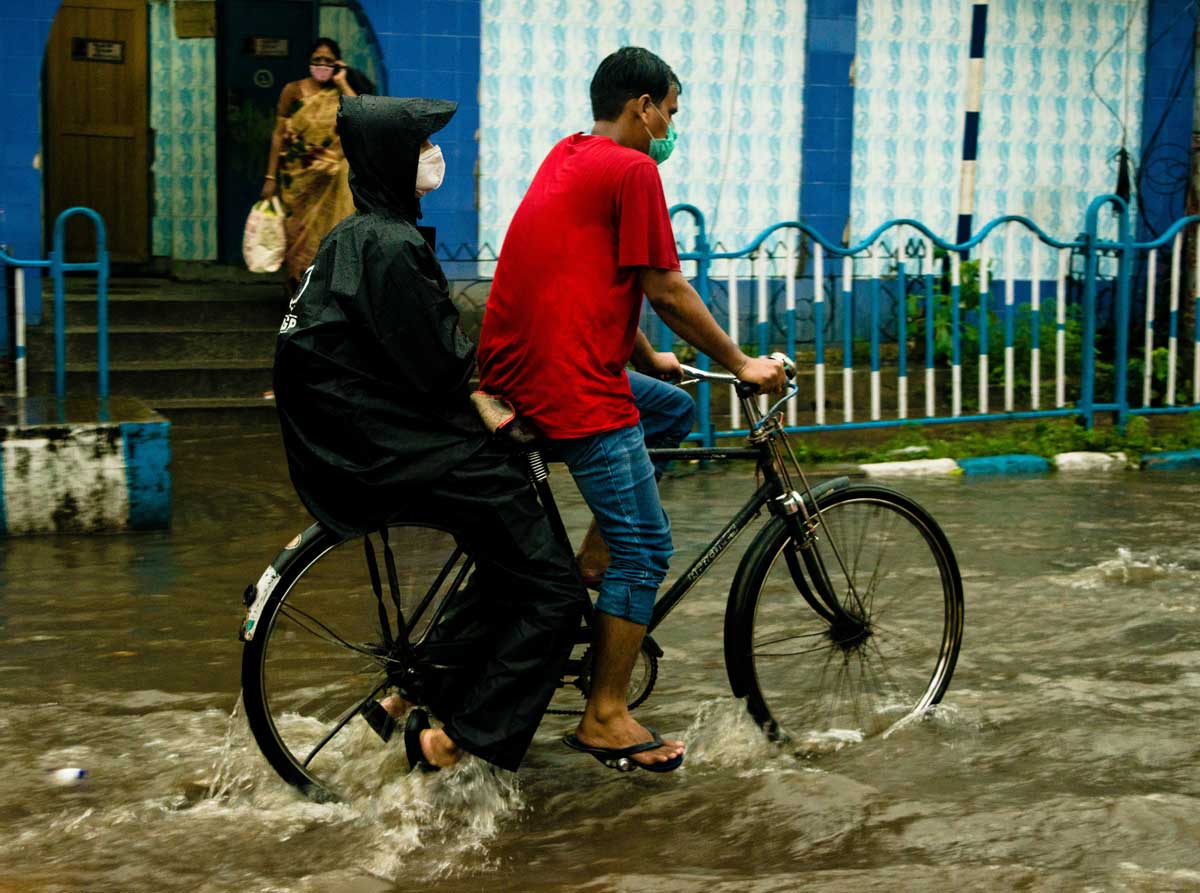 Local coming back on street again after flood descends